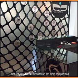 Thick Acrylic Jaalis embedded in the table and partition